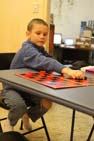 Daniel playing Checkers